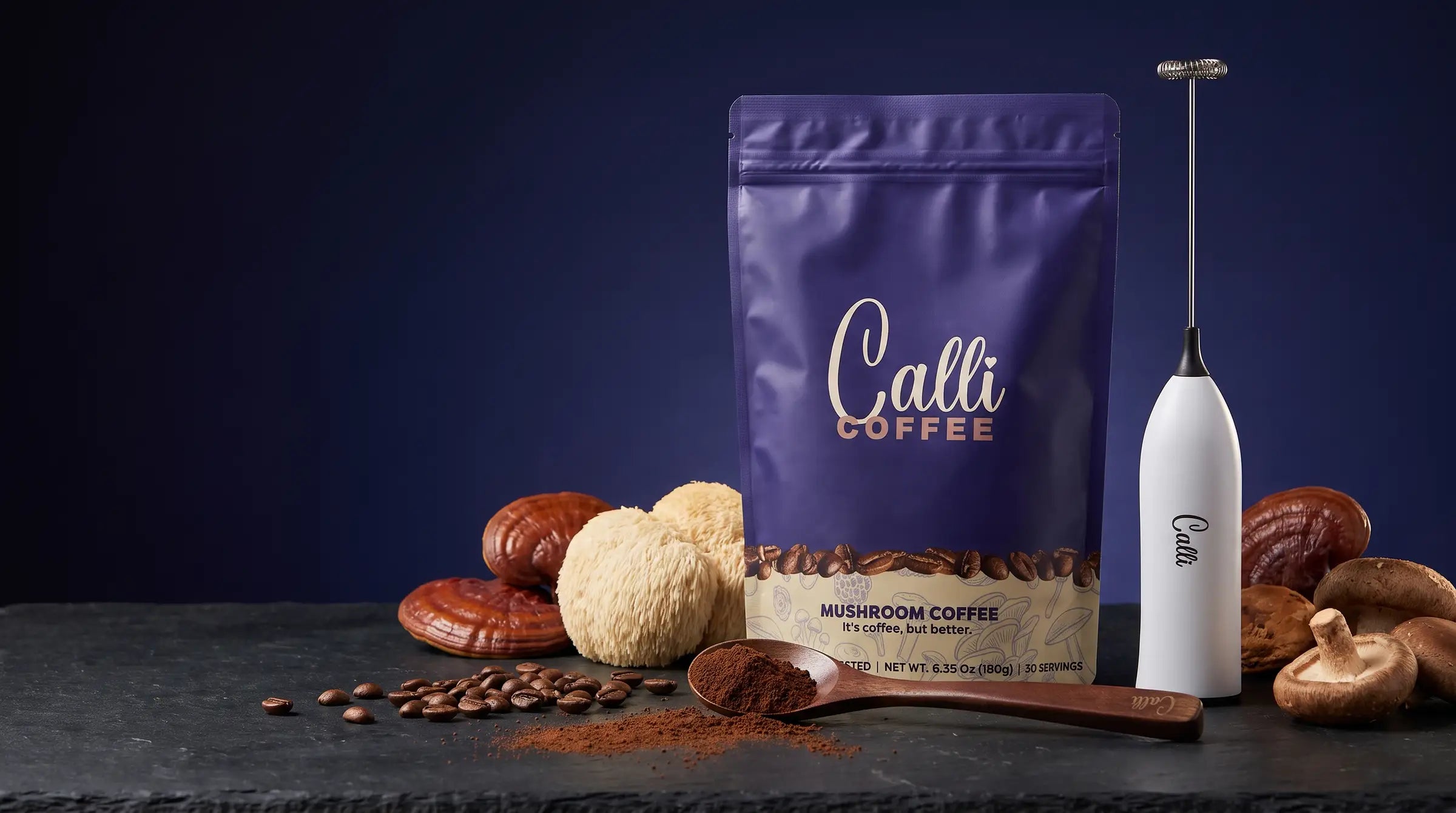Calli mushroom coffee pouch with the Calli milk frother, a wooden spoon of coffee powder, lion's mane, reishi and shiitake mushrooms and coffee beans