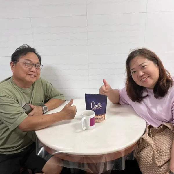 Calli customers with a pouch of Calli coffee